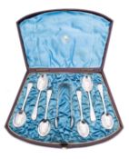 A cased set of Victorian silver Old English pattern teaspoons and sugar tongs by John Round & Son