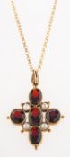 A 9ct gold garnet and pearl pendant and chain,