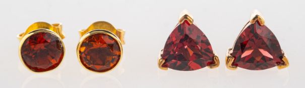 A group of two pairs of earrings,