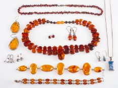 A mixed group of jewellery, including a rectangular pendant set with rainbow moonstone,