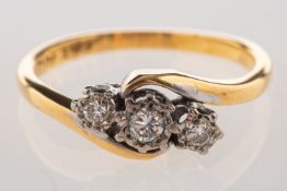 A diamond set twist ring, illusion set with three brilliant-cut diamonds, diamonds approx. 0.