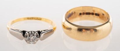 A group of two rings, including a single stone ring claw set with an old brilliant-cut diamond,