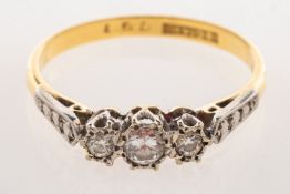 An 18ct three stone diamond ring, set with three brilliant-cut diamonds, diamonds approx. 0.