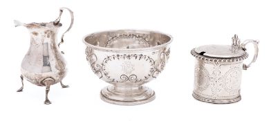 A George III silver cream jug by Elizabeth Muns, London 1769, of baluster form,