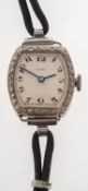 Peerex a ladies18k gold wristwatch with Rolex case and diamond set bezel the silvered cushion dial