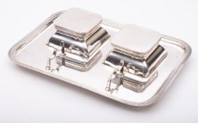 A George V silver desk tray/ inkstand by Aspreys & Co, Birmingham 1938, of rounded rectangular form,