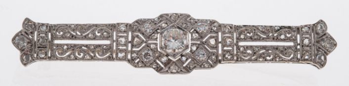 A fine antique diamond brooch, the panel with pierced scroll detail,