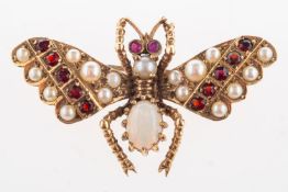 An insect brooch, in the form of a butterfly, set with an oval-cut opal cabochon,