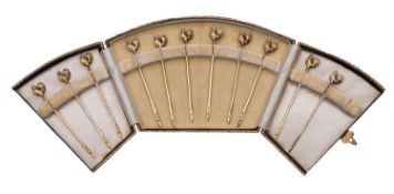 A cased set of eleven Edward VIII silver gilt cocktail stick/ toothpicks by Asprey & Co Ltd,