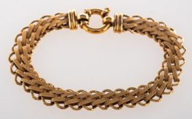 A 9ct yellow gold bracelet, with textured & polished oval links, UK import mark, length approx. 18.