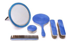 A George V silver and enamel mirror maker's mark rubbed but retailed by Finnigans Ltd,