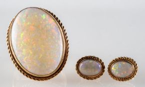 A 1970's 9ct gold opal ring and earrings,