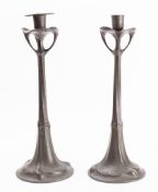 A pair of pewter candlesticks in Art Nouveau style,