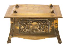 An embossed brass rectangular table casket in Arts & Crafts style,