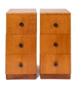 A pair of birdseye maple bedside chests of drawers in Art Deco style,