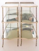 WITHDRAWN A pair of three tier mirrored etagere stands,