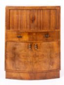 A walnut and burr walnut cocktail cabinet in Art Deco style,