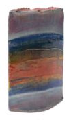A white stoneware slab vase of narrow elliptical form under bright polychrome banded glazes,