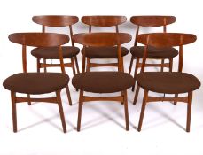 A stained hardwood draw-leaf dining table, probably Danish,