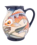 A Moorcroft pottery jug tube lined in the Quiet Waters pattern, after the original by Philip Gibson,
