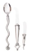 Carrol Boyes a pewter and steel cheese knife, butter knife and serving spoon.