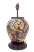 A Moorcroft pottery lamp base, tube lined in the Trout pattern, after the original by Philip Gibson,
