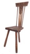 Ben Setter of Totnes, a carved and stained oak spinning chair,