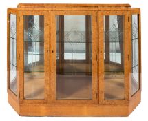 A burr walnut and glazed display cabinet in Art Deco style,