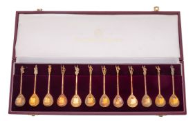 A cased set of twelve Elizabeth II silver gilt spoons by C.V.