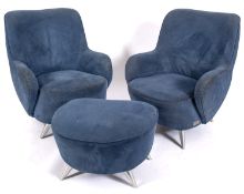 A pair of blue upholstered armchairs and a footstool en suite, designed by Vladimir Kagan,