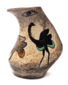 Andre Quiron [Contemporary] a stoneware ewer decorated with ostriches and a pair of eyes,