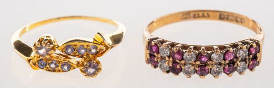A group of two rings, including a 9ct ye