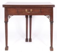 A George III mahogany tea table, circa 1