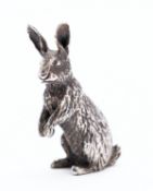 An Elizabeth II silver model of a seated