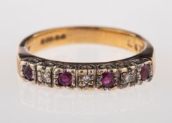 A ruby and diamond ring, a 9ct yellow &