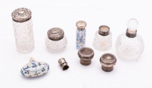 A group of silver and glass dressing tab