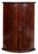 A George III oak walnut banded hanging c