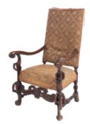 A carved walnut and embroidery upholster