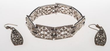 An Art Deco bracelet and earrings, circa