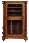 A Victorian walnut and glazed music cabinet,