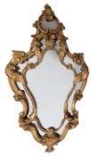 A carved and giltwood framed marginal wa