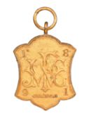 A Victorian gilt fob, obverse with a co