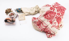 An early 20th century cream and red cros