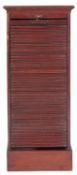 An Edwardian mahogany pedestal roll front filing cabinet, with a moulded top,
