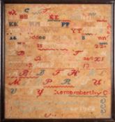 A Victorian needlework sampler, the work of Mary Leat, Crowhurst 1858,