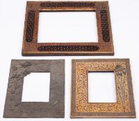 A Levantine carved hardwood and brass mounted rectangular picture frame,