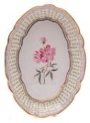 A Nantgarw shaped oval botanical dessert dish decorated in London with a central rose spray named