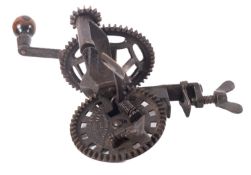 A bench mounted cast iron mechanical apple peeler, by C. E. Hudson, Leominster, Mass.