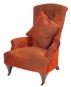 An Edwardian beech frame armchair,