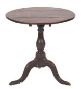 A George II elm circular occasional table,